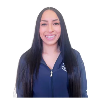 A woman with long straight black hair, wearing a dark zip-up jacket, is smiling at the camera against a plain white background.